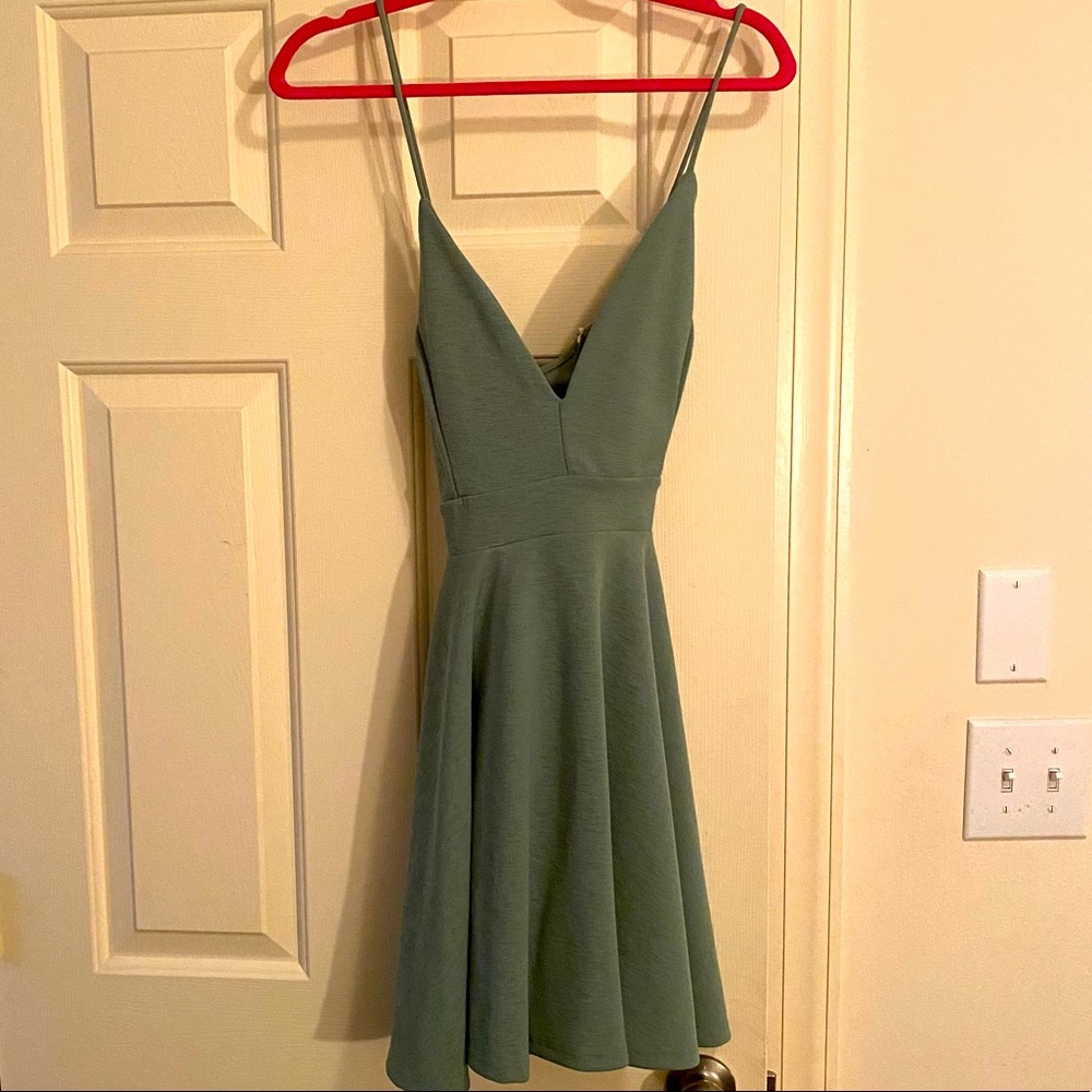 Deep-V spaghetti strap sage green mini dress